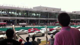 Porsche crashes into Ferrari, spectators applaud
